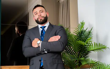 Men in suits having a threesome