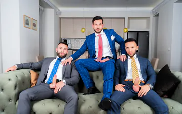 Men in suits having a threesome