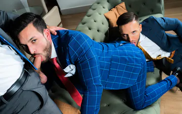 Men in suits having a threesome