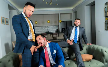 Men in suits having a threesome