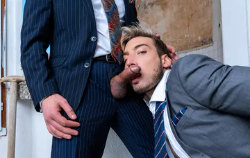 Guys in suits having gay sex