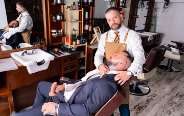 Men having sex in the barber shop