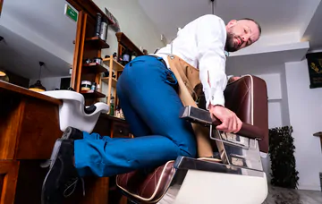 Men having sex in the barber shop