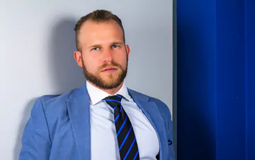 Men in an office fucking