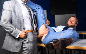 Men in an office fucking