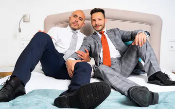 Clothed guys fucking in the shower