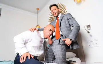 Clothed guys fucking in the shower