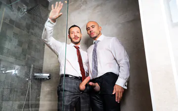 Clothed guys fucking in the shower