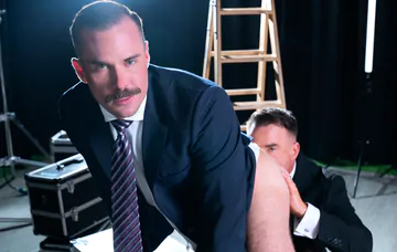 Men in a TV studio fucking