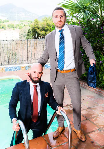 Two guys in suits fucking
