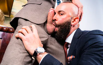 Two guys in suits fucking