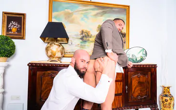 Two guys in suits fucking