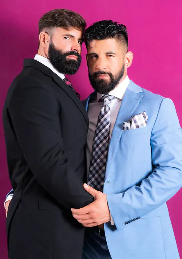 Clothed men fucking in a hottub