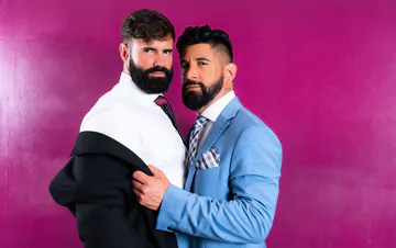 Clothed men fucking in a hottub