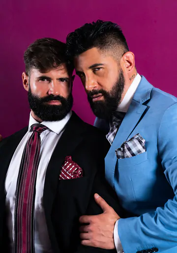 Clothed men fucking in a hottub