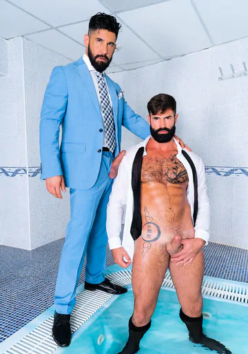 Clothed men fucking in a hottub