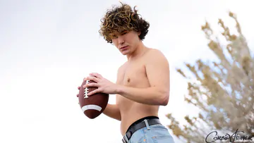 Curly haired guy showing cock