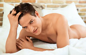 Black haired hottie with a massive cock