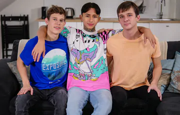 Cute boy in a threesome