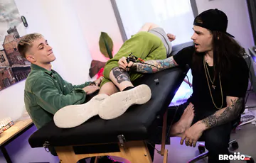 Guys in a tattoo parlour fucking