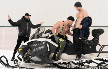Snowmobile guys having a threesome