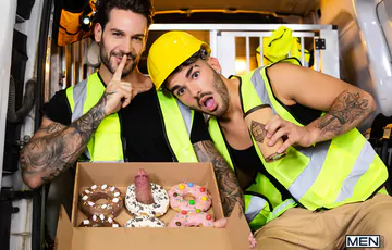 Gays in a van having sex