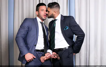 Men in suits having bareback sex