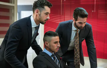 Business men having gay sex