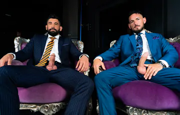 Men in blue suits getting naughty