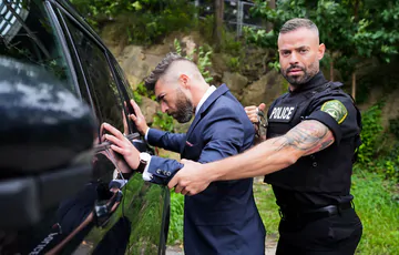 Sexy police man fucking a guy