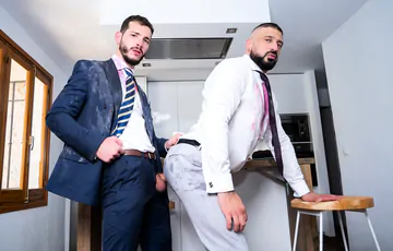 Men in a kitchen having sex