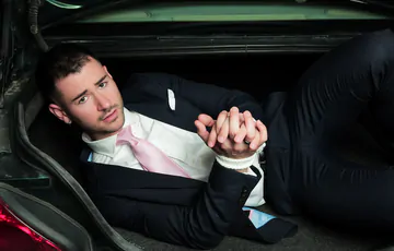 Guys in suits having sex