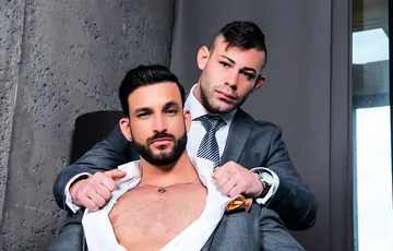 Men in suits fucking on a sofa