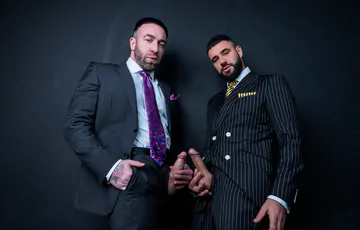 Men in suits having wild sex