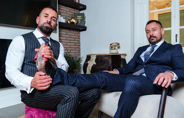 Men in suits having kinky sex