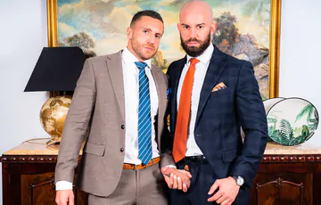 Two guys in suits fucking